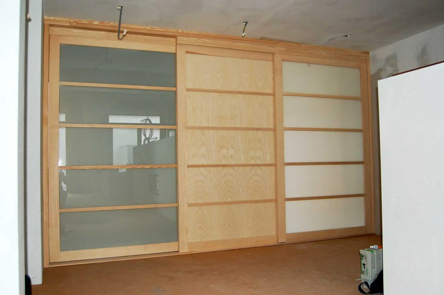 Porte coulissante en bois sur mesure